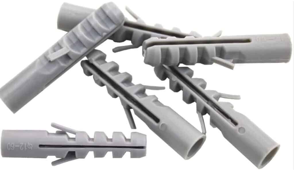 Plastic drywall anchors for secure mounting.