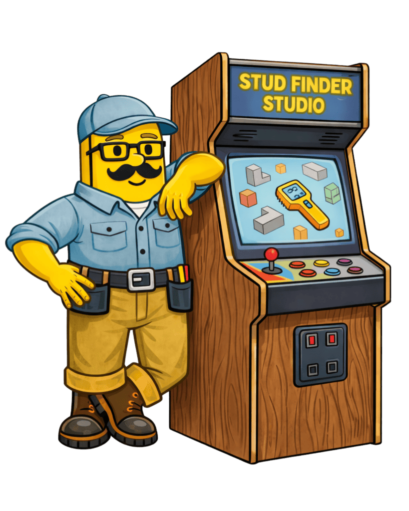 Arcade game with a character next to a Stud Finder Studio machine in a game room.